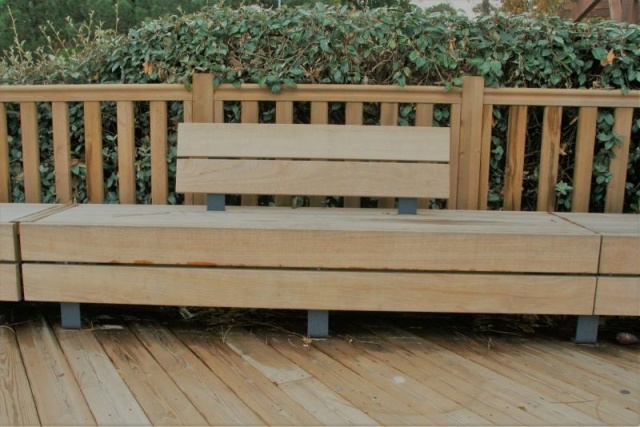 euroform w - street furniture - long angled bench made of wood on city square - designer bench made of wood for outside - wooden seating island for urban space - Isola IIII high quality street furniture