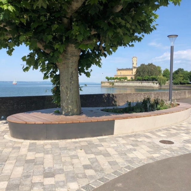 euroform w - urban furniture - custom-made - Organic bench around tree - big planter by the lake - seating island on public square on promenade