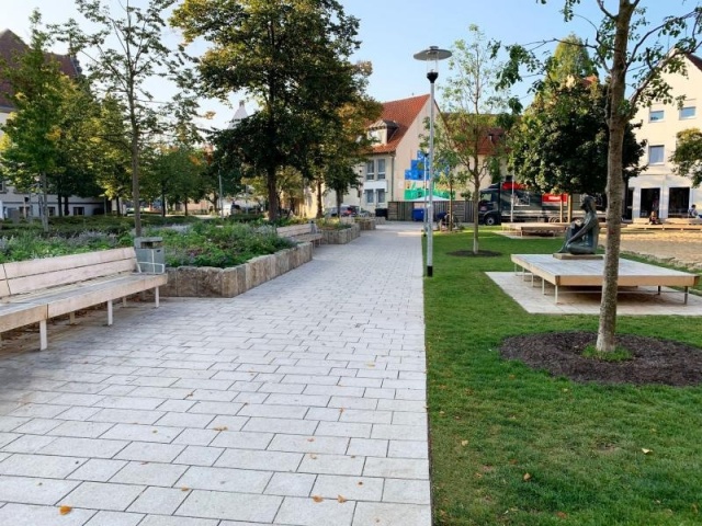 euroform w - urban furniture - custom-made - bench on public square - seating island for urban parks