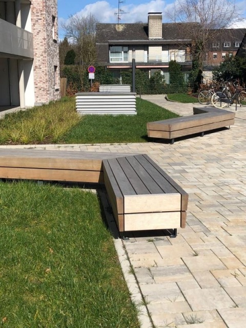 euroform w - street furniture - Bench Isola made of wood in courtyard in Germany - minimalist bench for public space - wooden park bench for outdoors