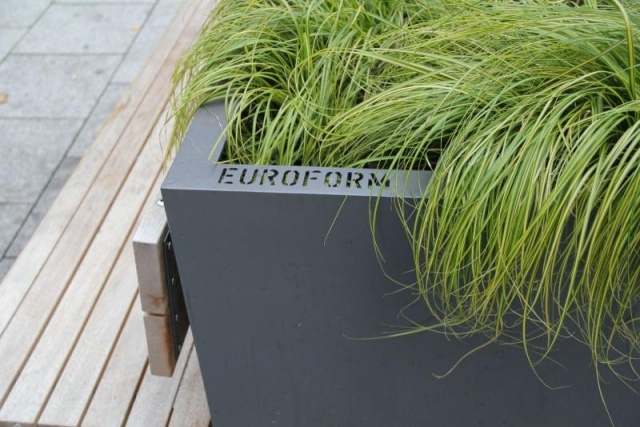 euroform w - sustainable street furniture - park bench wood - modular bench in the city centre of Stuttgart - big planter with bench in urban environment - sustainable seating for open space