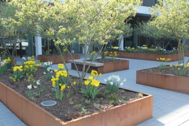 euroform w - street furniture - robust bench made of high-quality wood for urban spaces with planter - minimalist wooden seating for outdoors - high-quality designer street furniture - planter made of Corten steel