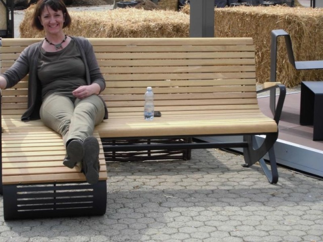 euroform w - street furniture - robust bench made of high quality wood for urban spaces - minimalist wooden seating for outdoors - high quality designer street furniture - hardwood bench with footrest for public parks 