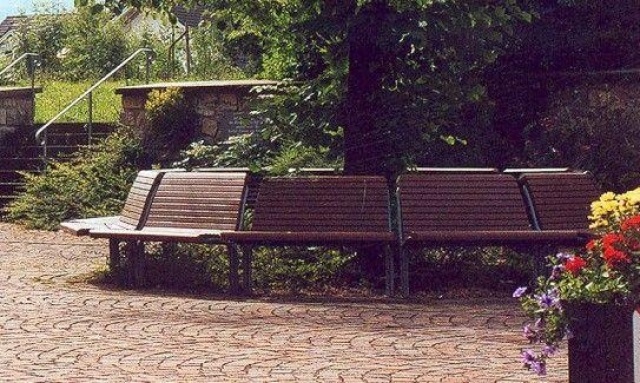 euroform w - street furniture - robust bench made of high-quality wood for urban spaces - minimalist wooden seating for outdoors - high-quality designer street furniture - modular circular bench made of wood
