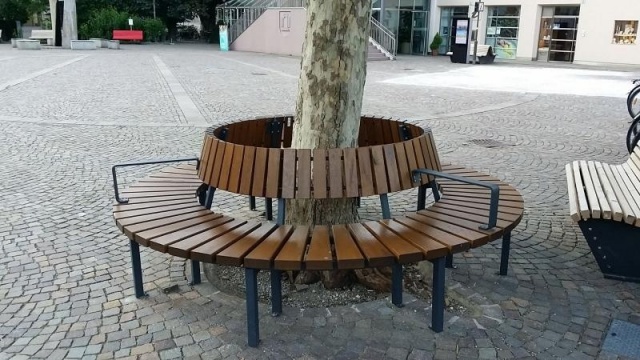 euroform w - street furniture - robust circular bench made of high quality wood for urban spaces - minimalist wooden seater for outdoors - high quality designer street furniture - classic wooden round bench