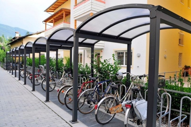 euroform w - street furniture - bike rack with shelter in a residential complex in South Tyrol - Galleria Metal and glass shelter - velostation for cities