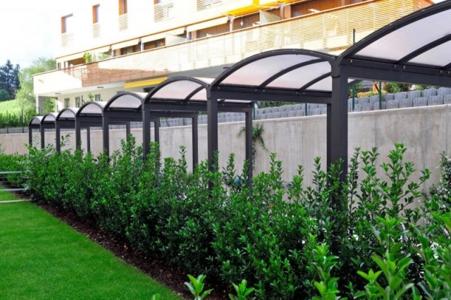 euroform w - street furniture - bike rack with shelter in a residential complex in South Tyrol - Galleria Metal and glass shelter - velostation for cities