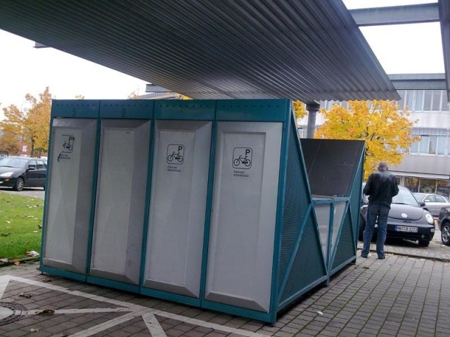 euroform w - street furniture - bike box with charging station and lock - bike storage with locking system for bike sharing - bike box for bikes, scooters, prams - Silhouette bike shelter for train stations