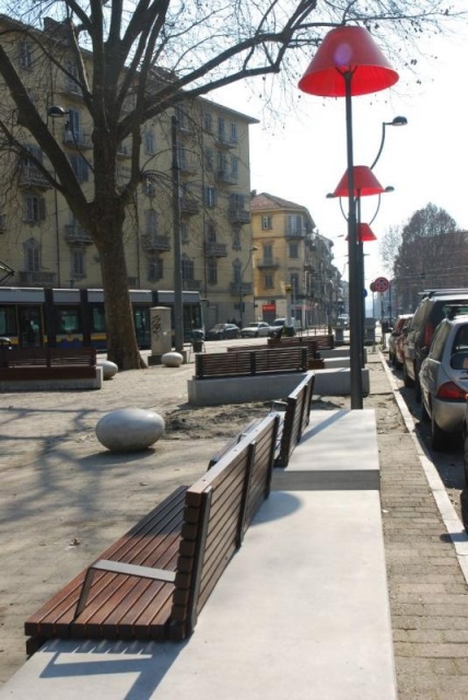 euroform w - urban furniture - customized wooden bench with high backrest at public place in Torino - wooden seating in city centre - customized bench tops on concrete base