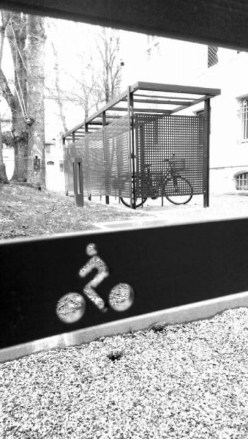 euroform w - urban furniture - bike storage in metal and glass - bike box - bike racks with bikes parked