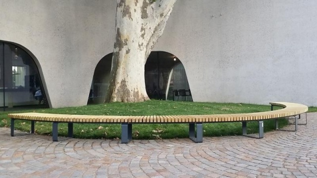 euroform w - urban furniture - wooden circular bench at public square - wooden tree seating - customized bench for Treehugger architecture