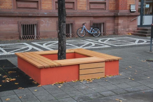 euroform w - street furniture - wooden bench in public space - seating island for cities - custom-made designer furniture for outdoors