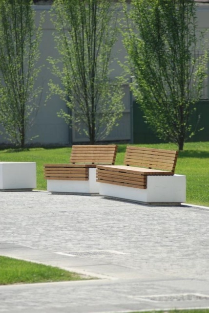 euroform w - street furniture - bench top with wooden backrest on concrete base - seating island for public space - benches in park Turin Italy - designer furniture for outdoors